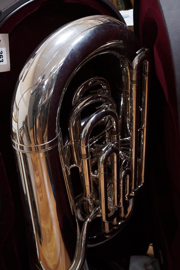 A cased Besson Sovereign tuba, together with three mouthpieces; an Alliance H2, and two by Denis Wick, London